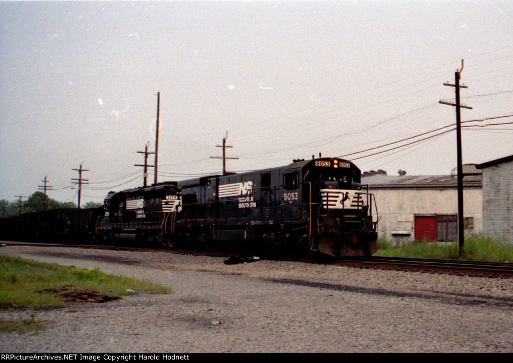 NS 8053 & 3279 lead an empty coal train westbound